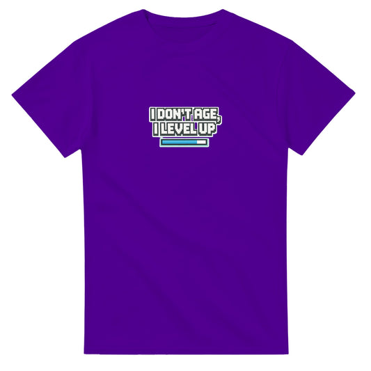 Purple t-shirt with text 'I DON'T AGE, I LEVEL UP' on a white background